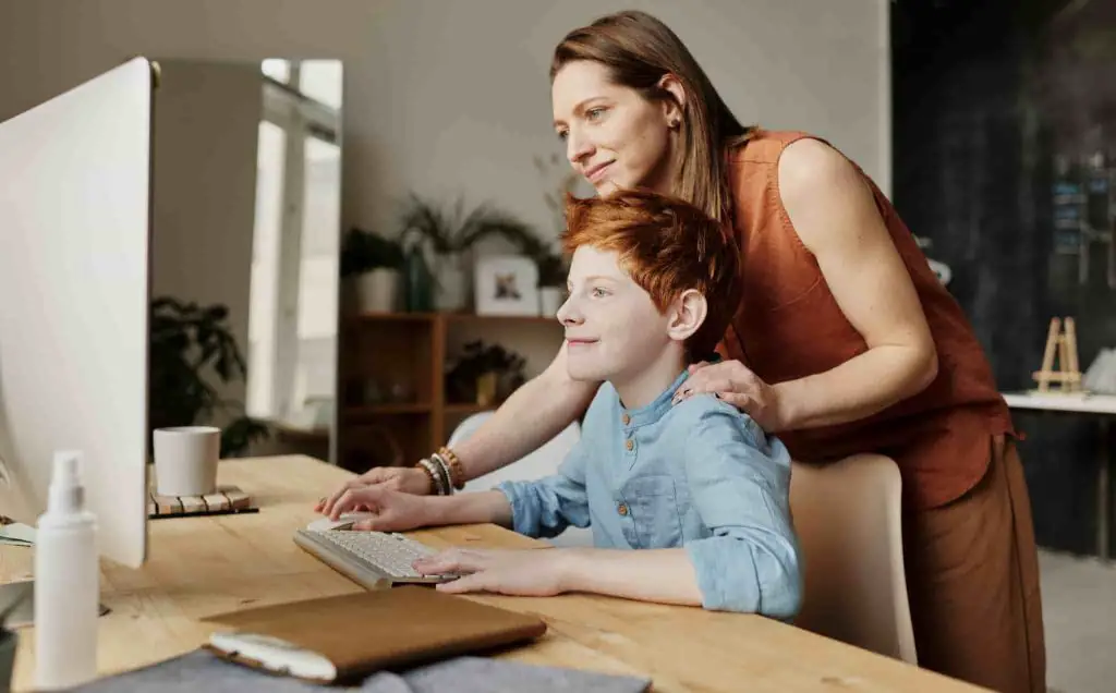 Woman teaching her son